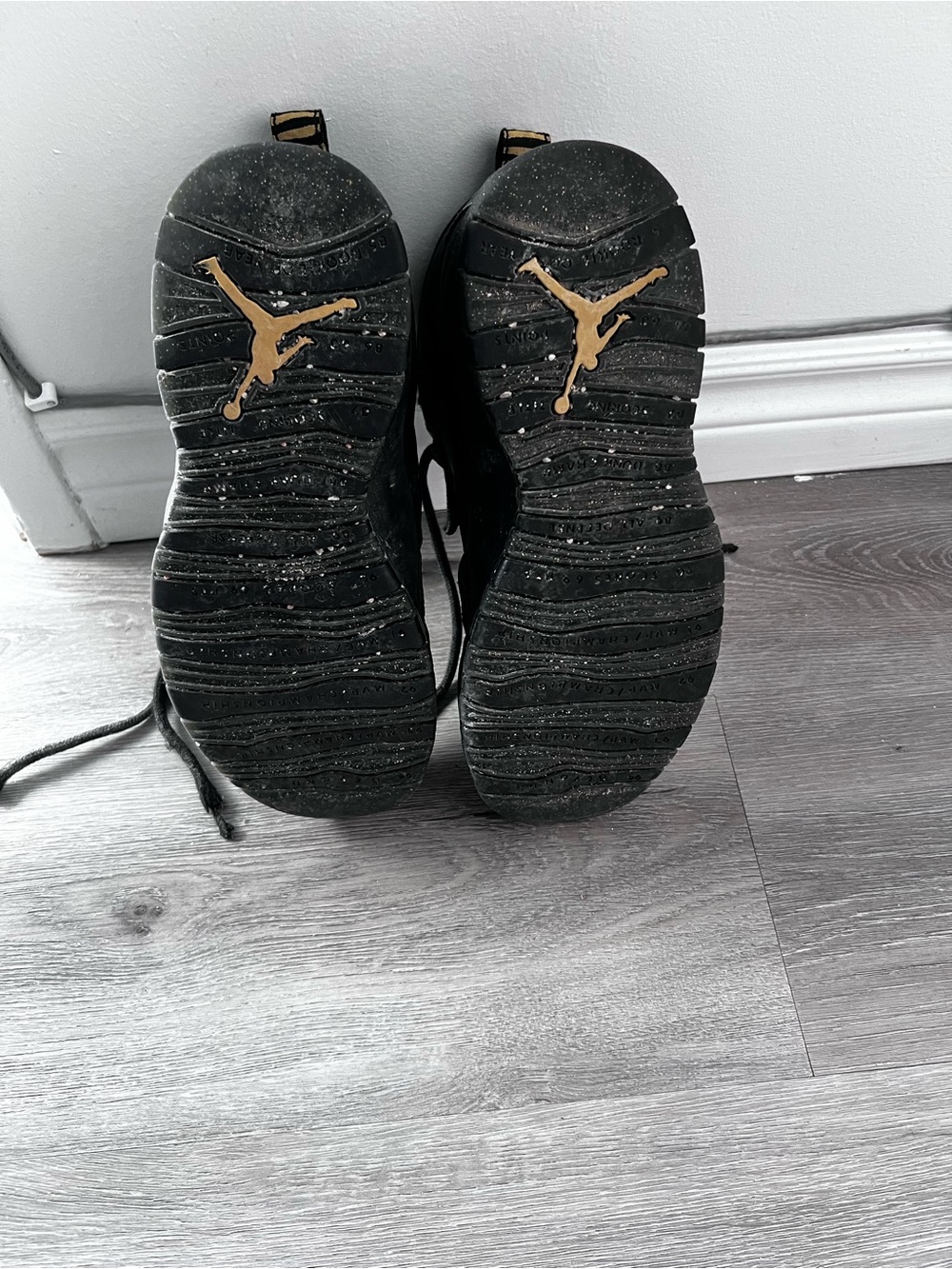 Nike Men’s Black Sneakers with Gold Jumpman Detailing